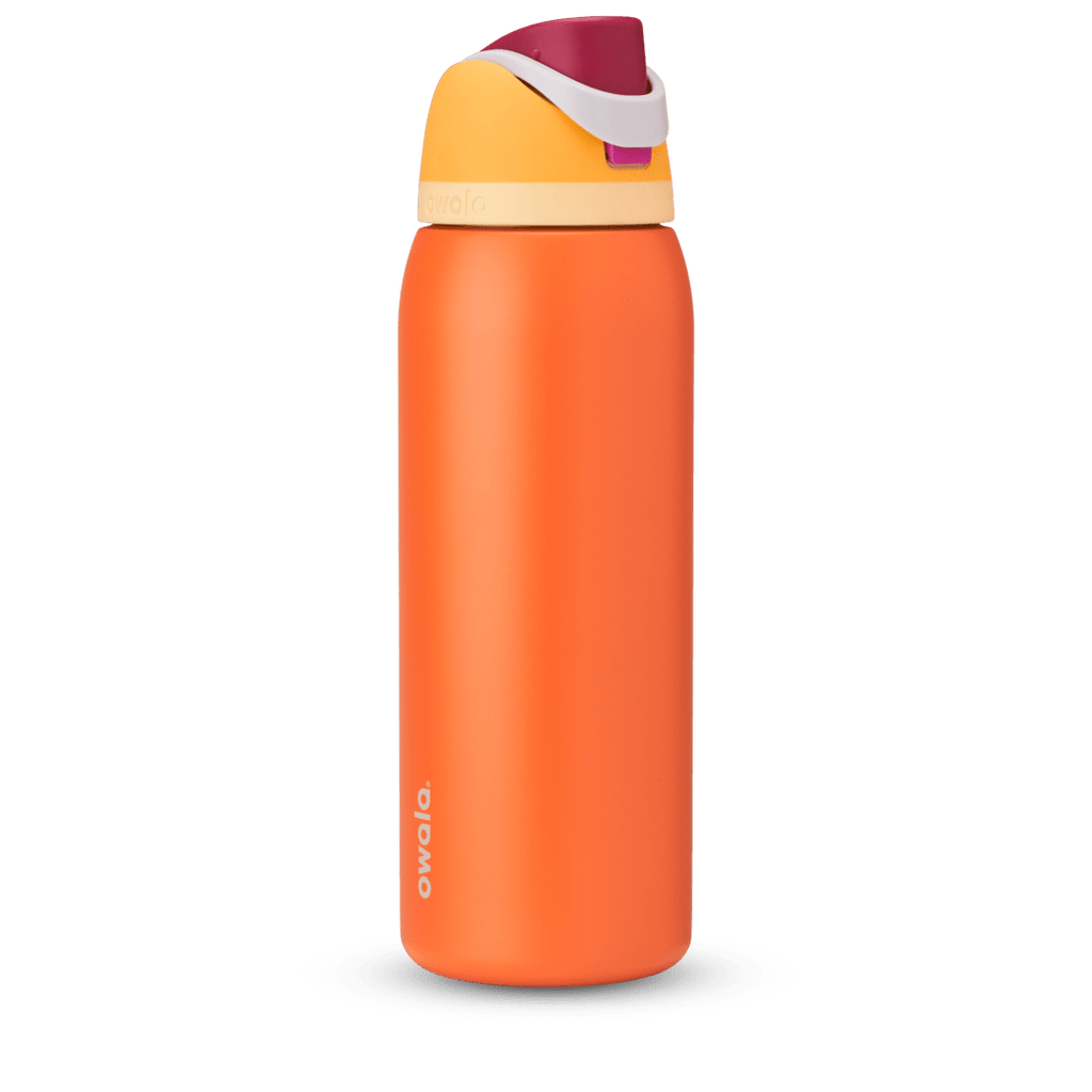 FreeSip 40oz in Citrus Crush, bright orange body with yellow flip cap, magenta carry loop, and cream accent band
